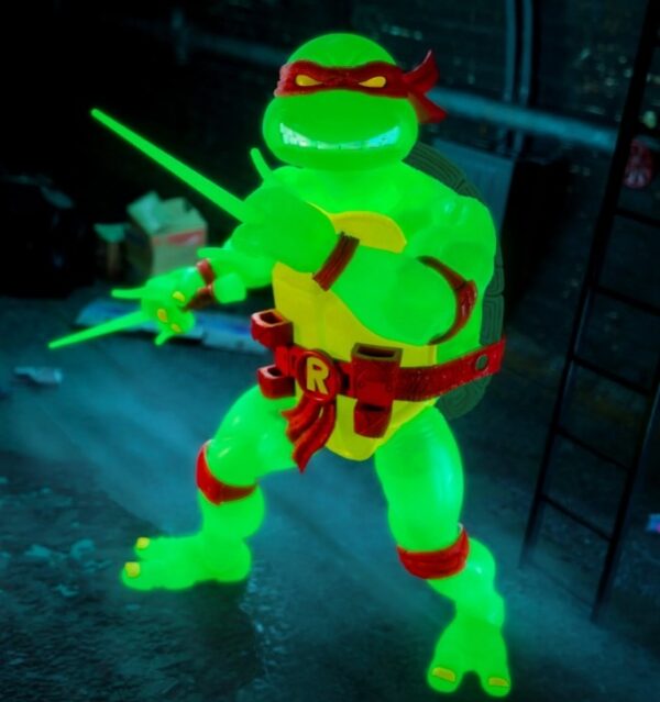 STL243280_3 TMNT ULTIMATES RAPHAEL MUTAGEN OOZE GLOW FIG
